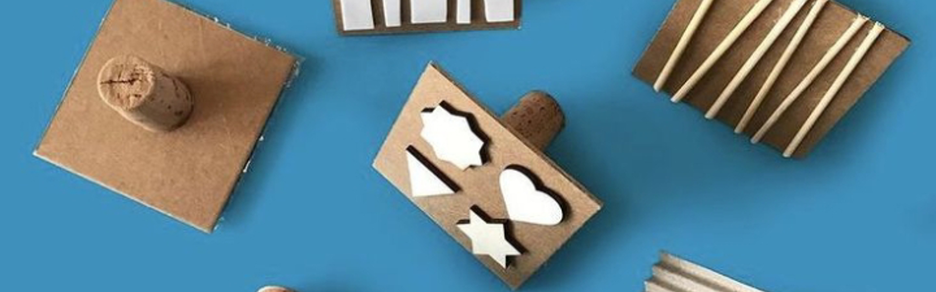 Main Image: cute handmade paint stamps in different designs and shapes, made using cardboard, cork and other everyday materials. A fun and easy craft for kids.