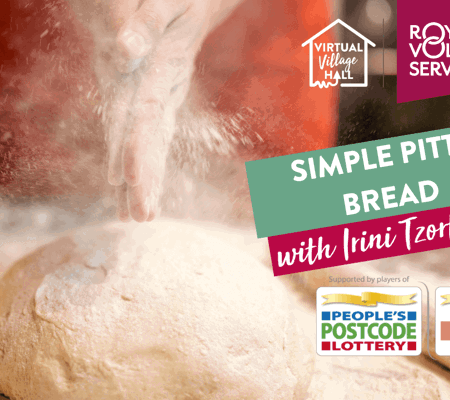 fresh bread dough being rolled out on a clear surface with flour