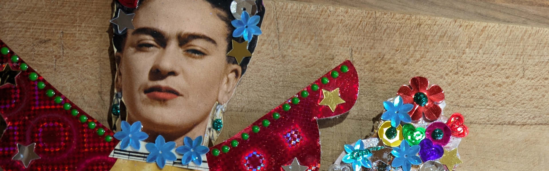 a Frida Kahlo themed collage cardboard Christmas angel decoration