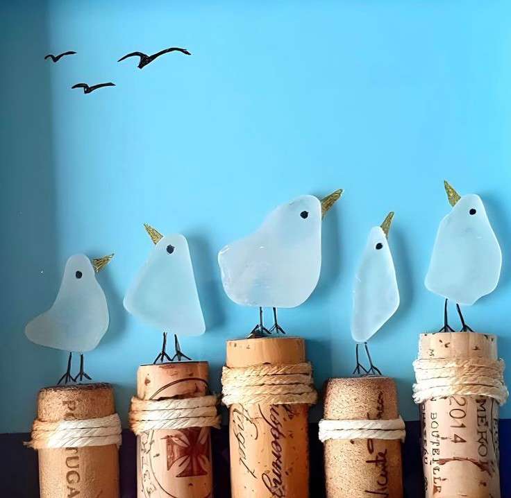 Main image: sea glass bird art, cute little sea glass bird 'stood' on top of corks wrapped in string, with little legs, eyes and beaks drawn in marker pen. 