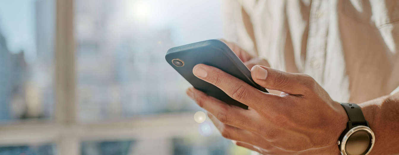A person looking at their mobile phone