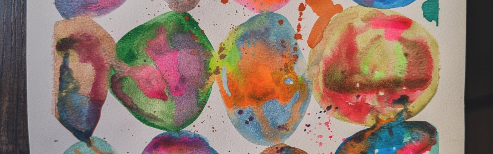 Colourful Abstract Watercolour and Ink Wall Art by Rosie Johnson, different coloured circles and paint splatters.
