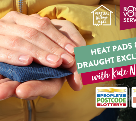 a person wearing a yellow winter coat holding a handsewn handwarmer