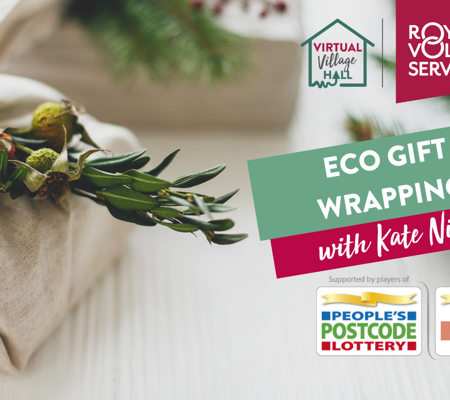 a close up of eco friendly Christmas gift wrapped presents topped with Christmas foliage