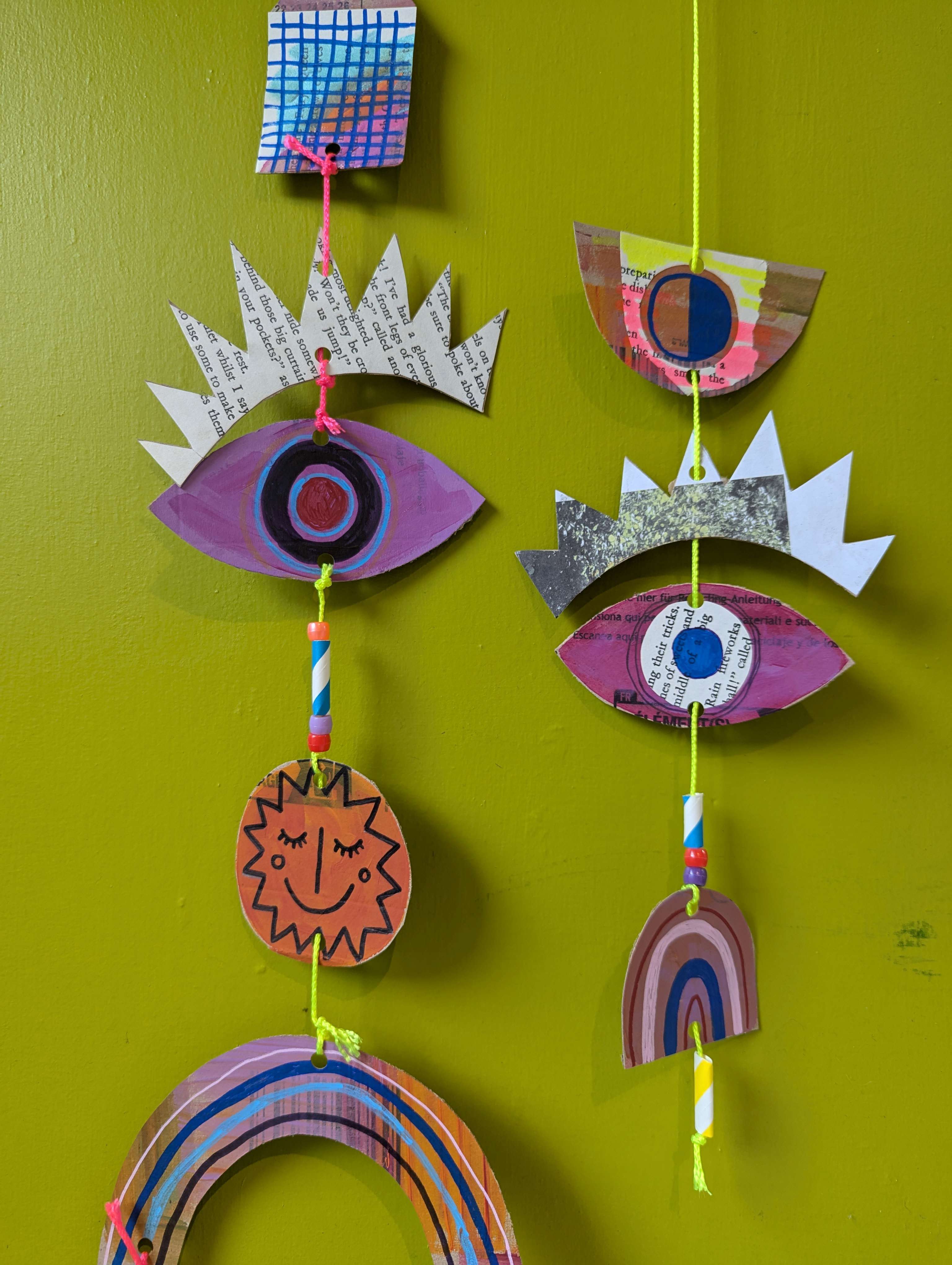 a close up of a mixed media hanging mobile made by Rosie Johnson