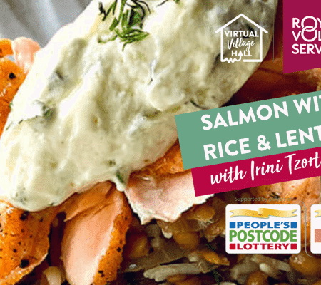 a fillet of salmon on a bed of wild rice with a creamy sauce and fresh dill