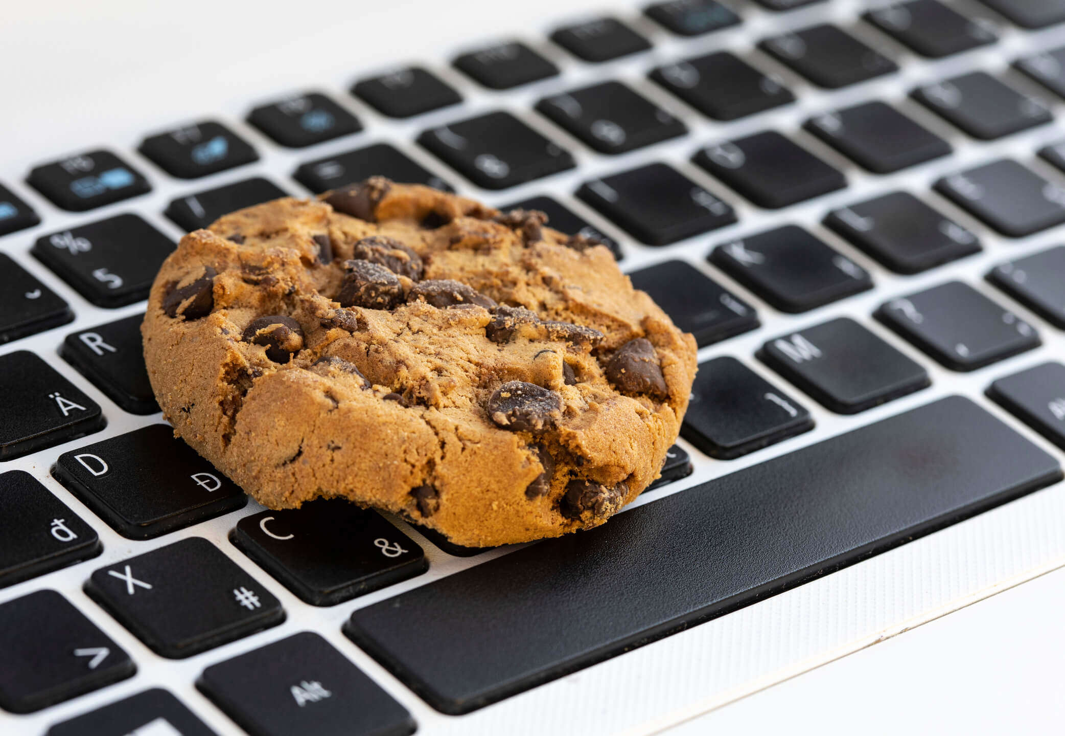 A cookie on a computer keyboard