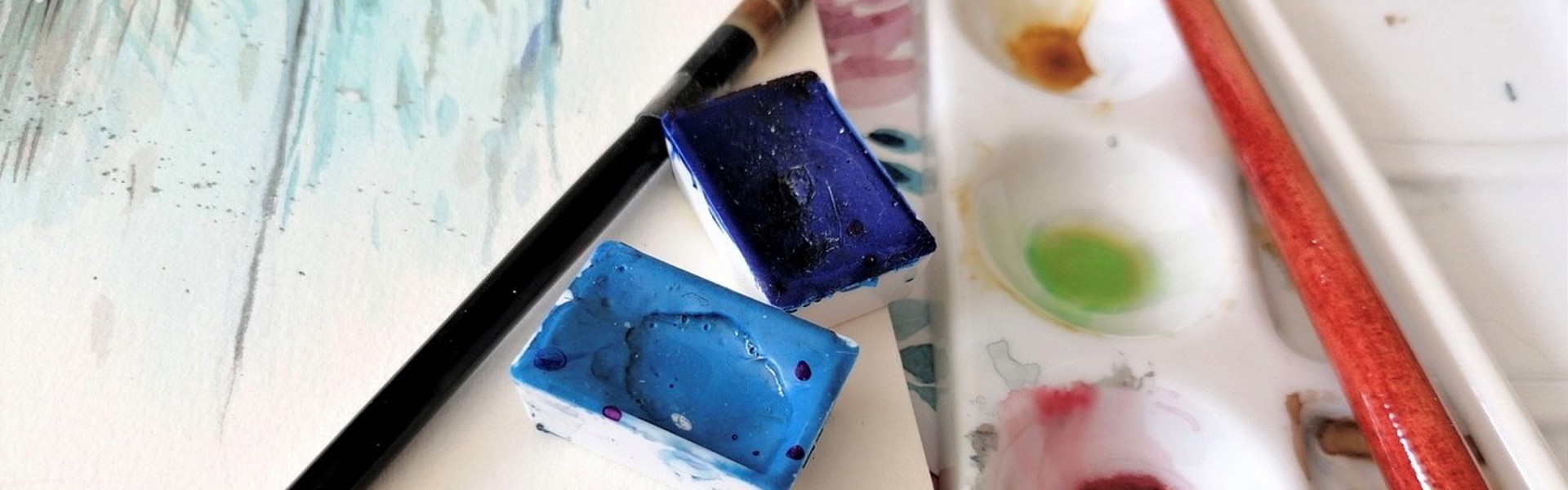a close up of watercolour painting materials