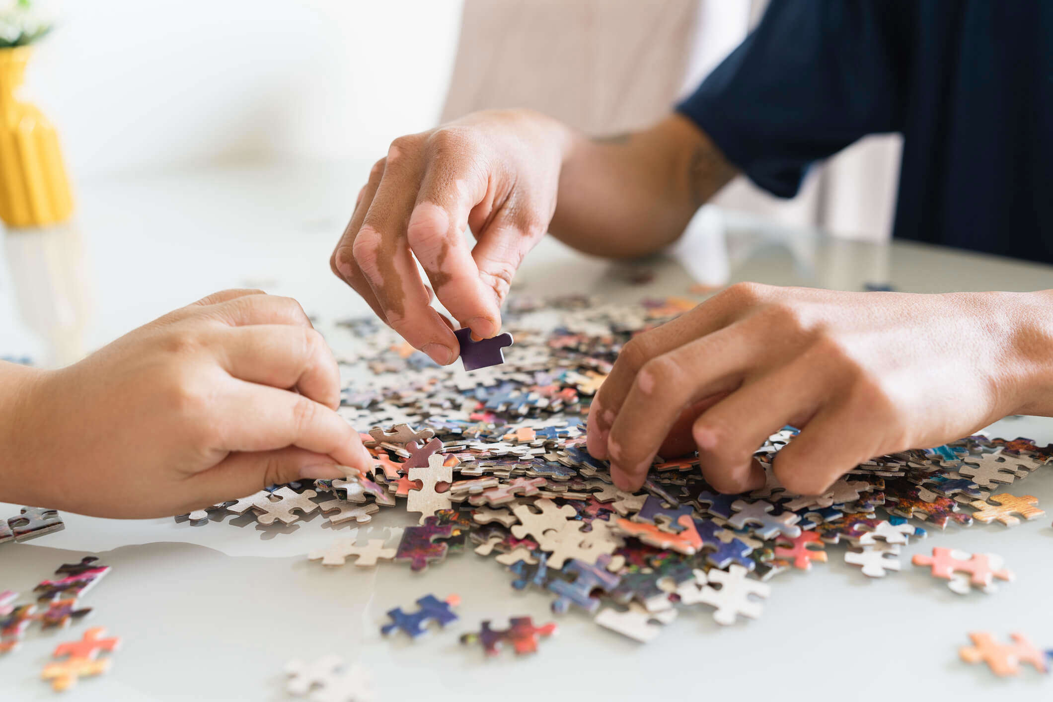 A couple working on a jigsaw puzzle