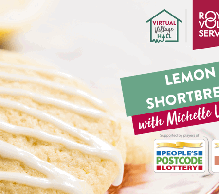 lemon shortcake biscuits topped with white zigzag icing on a pink plate