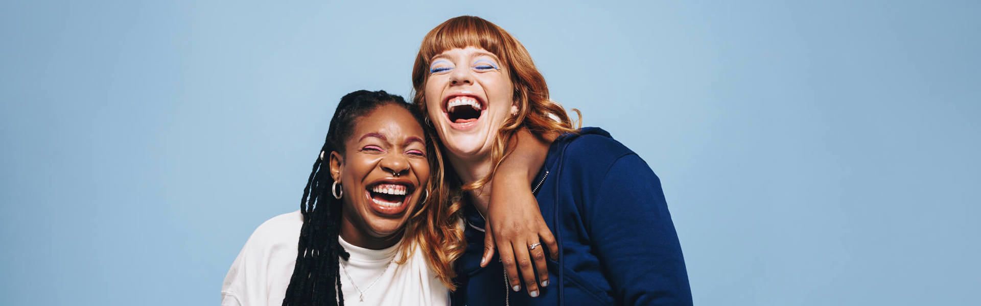 Two best friends laughing and having a good time together
