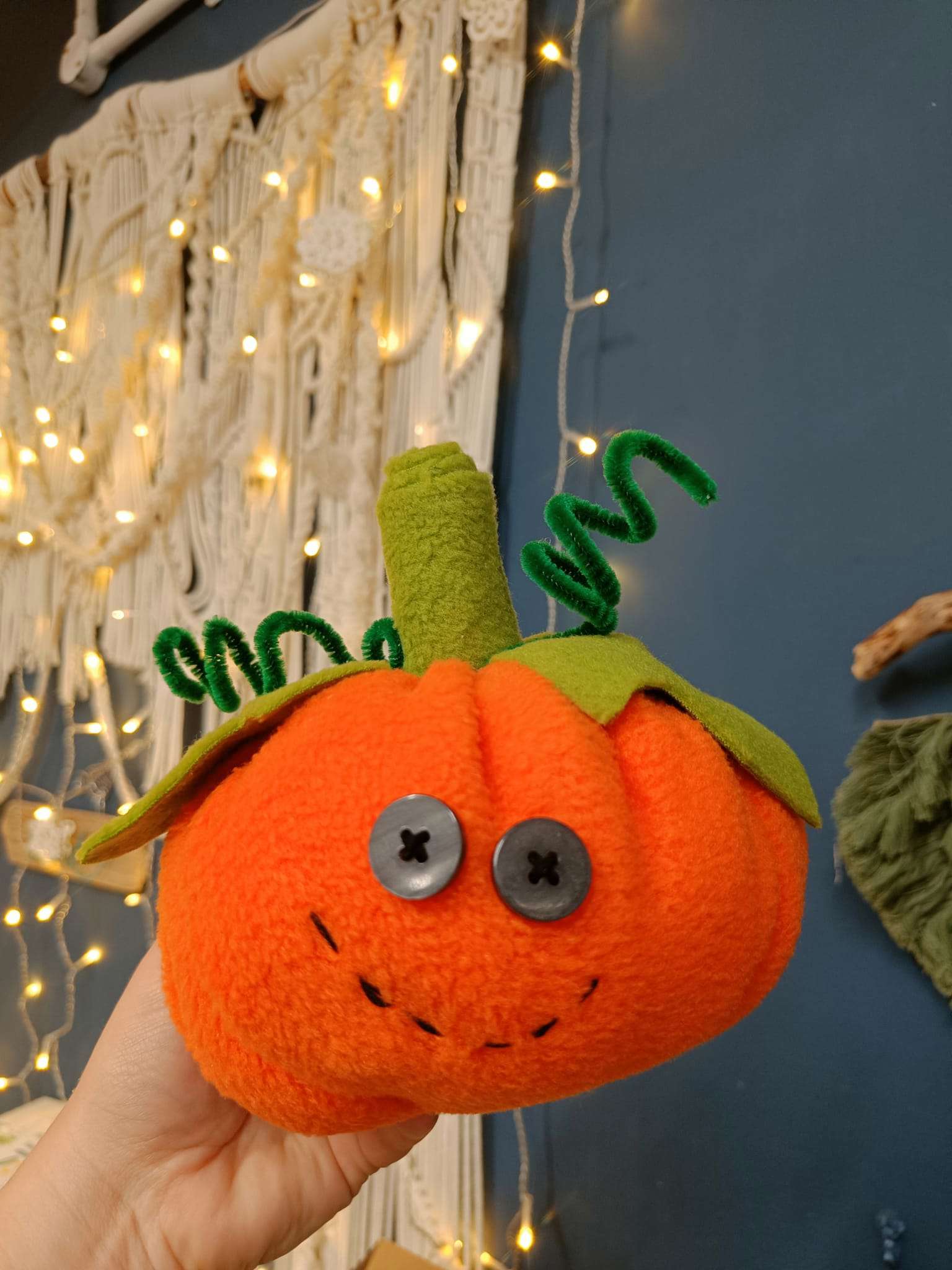 A pumpkin plushie made by Gemma Forde