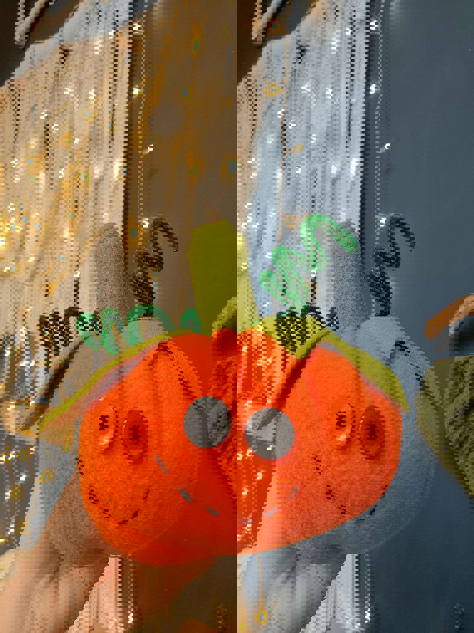 A pumpkin plushie made by Gemma Forde