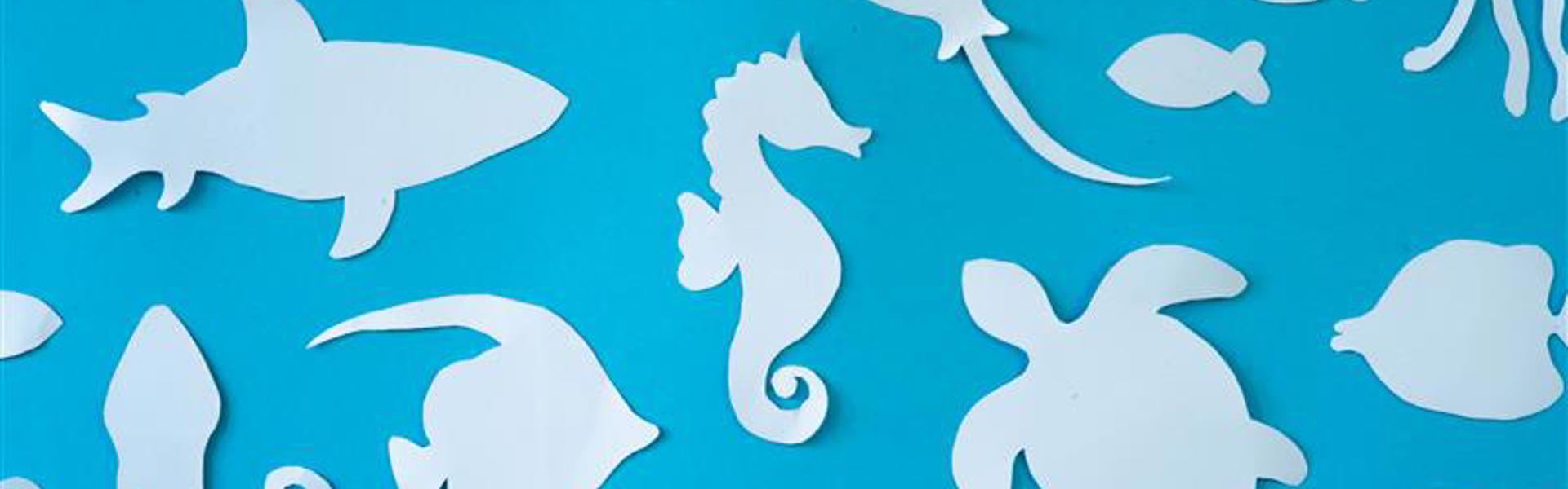 Main Image: underwater paper collage - blue paper with light blue paper sea creatures.