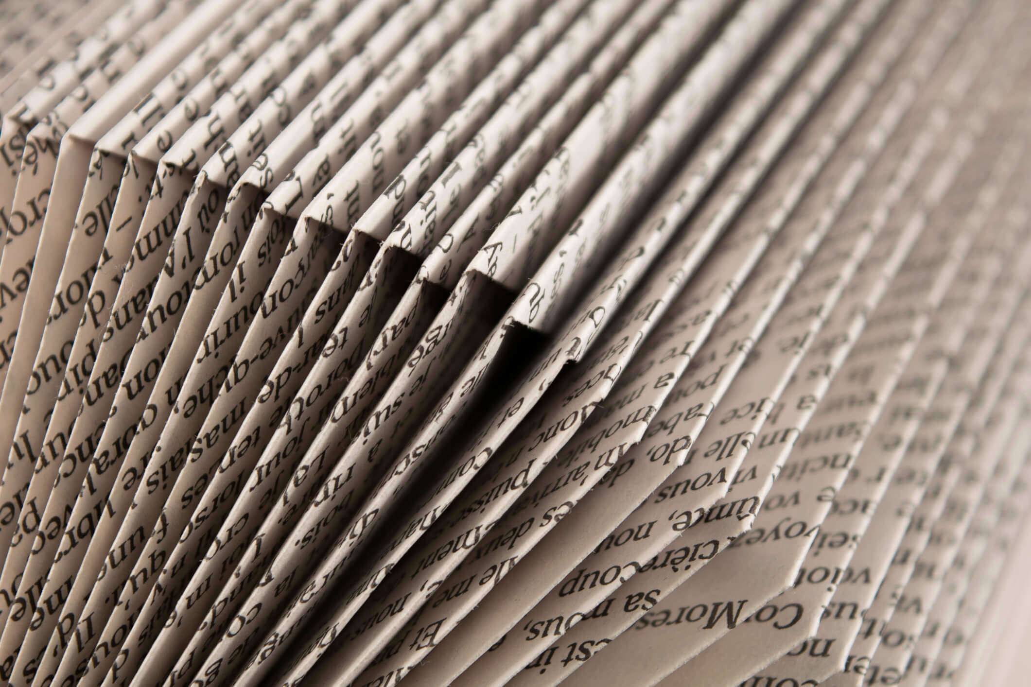 a close up of a book used for origami 