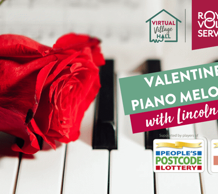 a rose lying on piano keys
