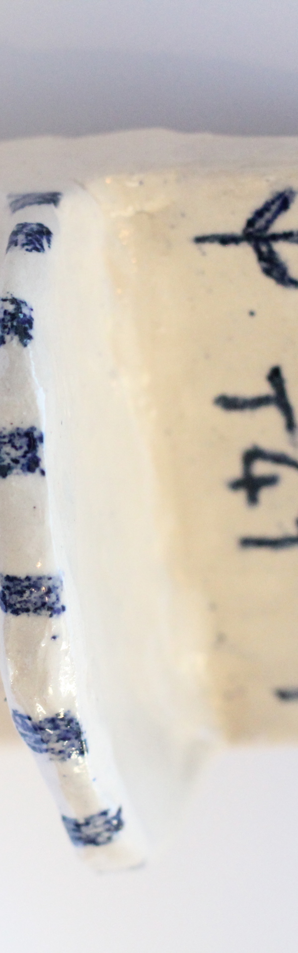 Main Image: A cream and blue air dry clay, incense holder wall hanging/shelf.