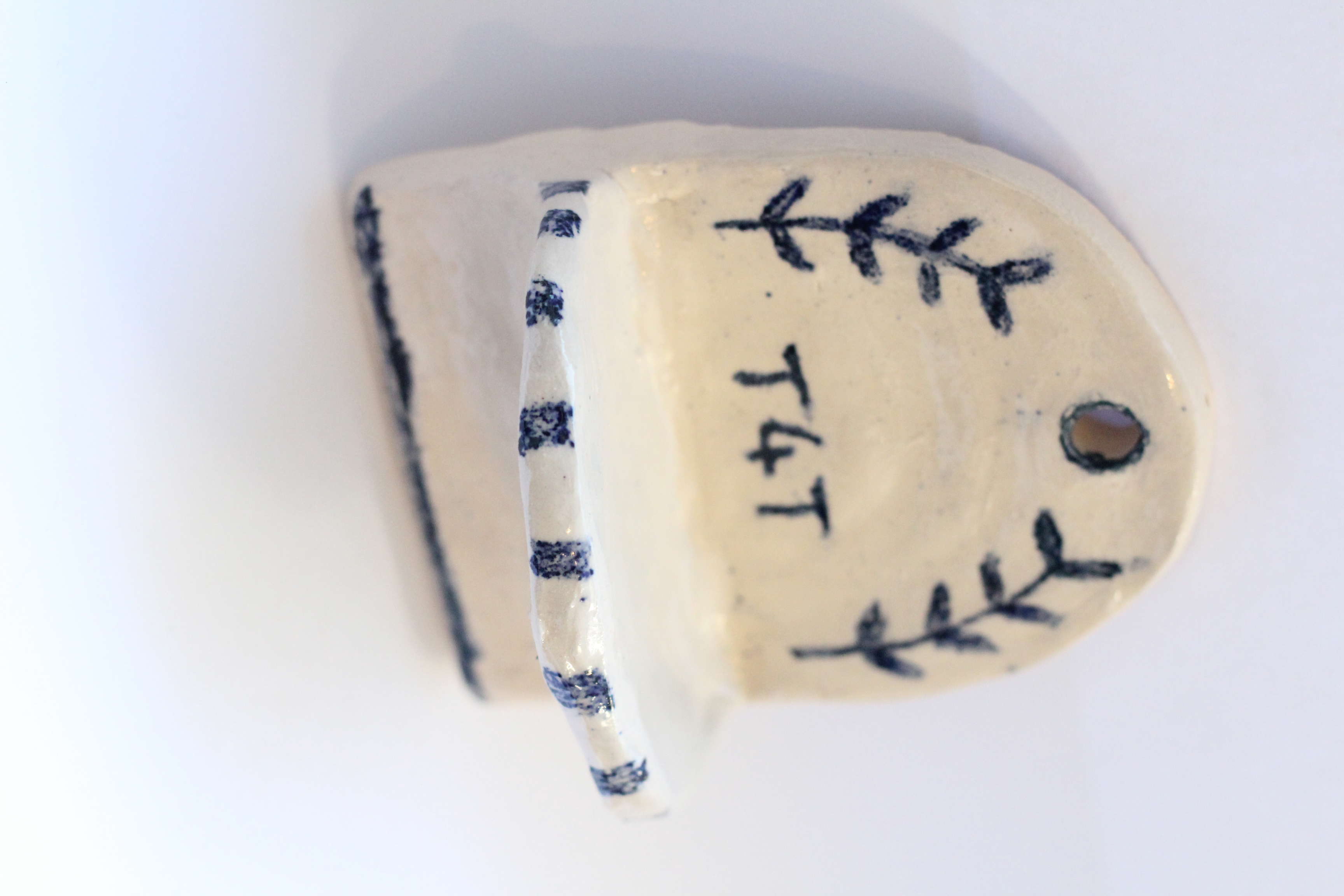 Main Image: A cream and blue air dry clay, incense holder wall hanging/shelf.