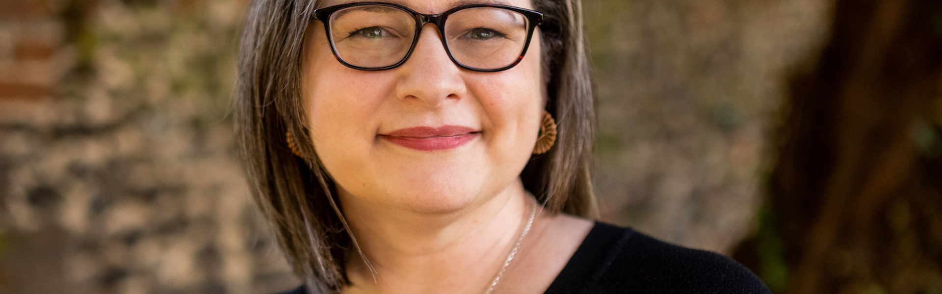 Main image: a photo of murder mystery author Katy Watson smiling.