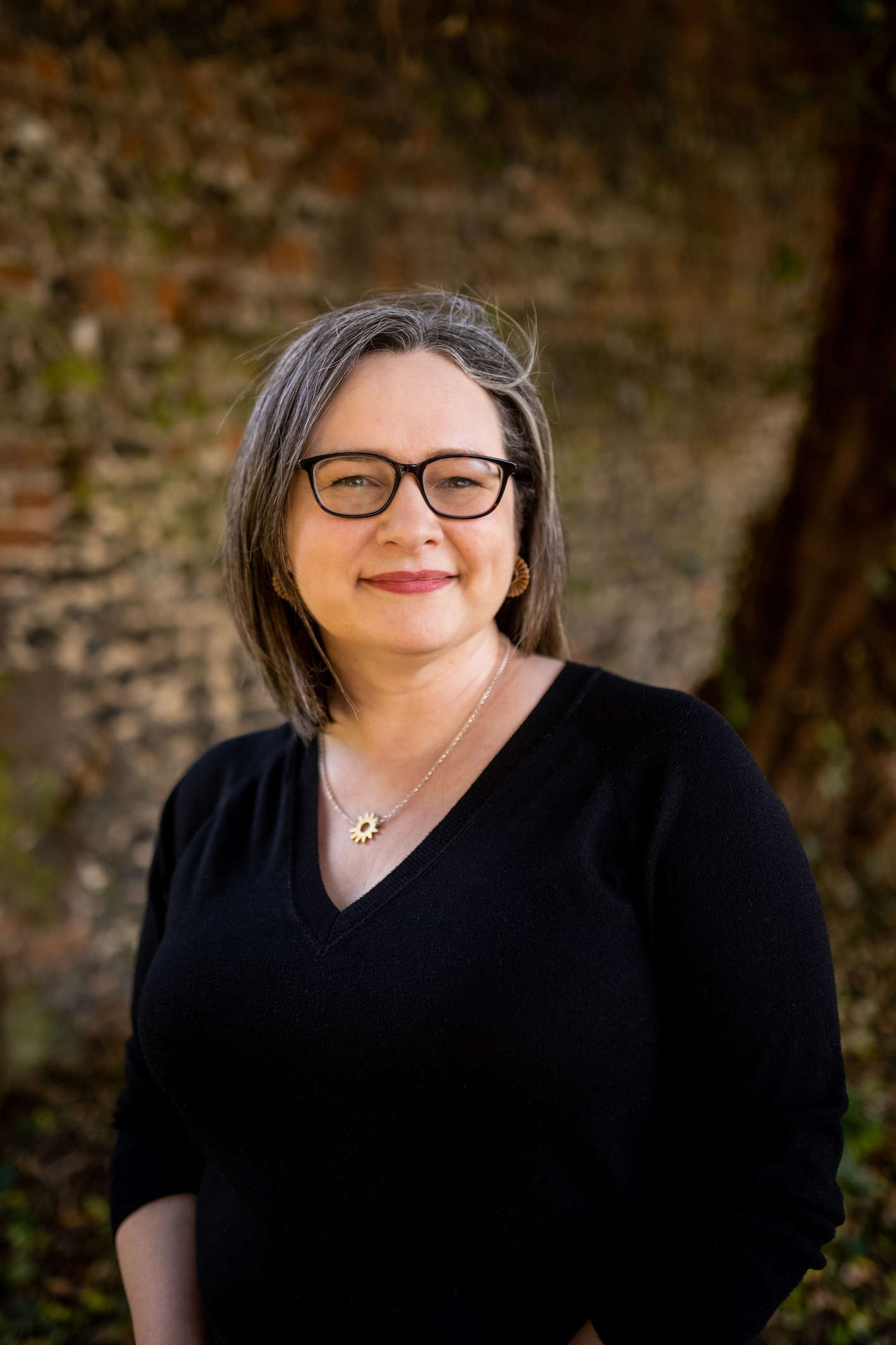 Main image: a photo of murder mystery author Katy Watson smiling.