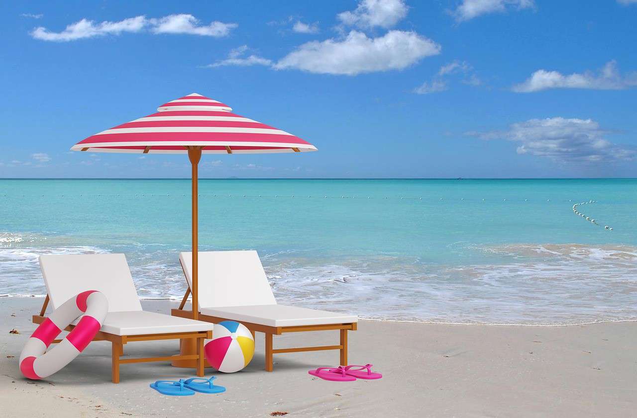 two beach deck chairs on a beach scene surrounded by beach balls flip flops and rubber rings