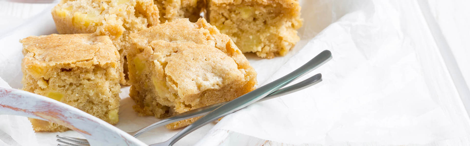 homemade blondies on a white serving tray