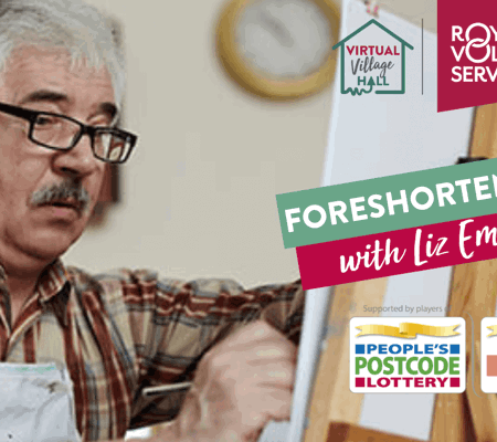 An elderly man using an easel to draw in an art class