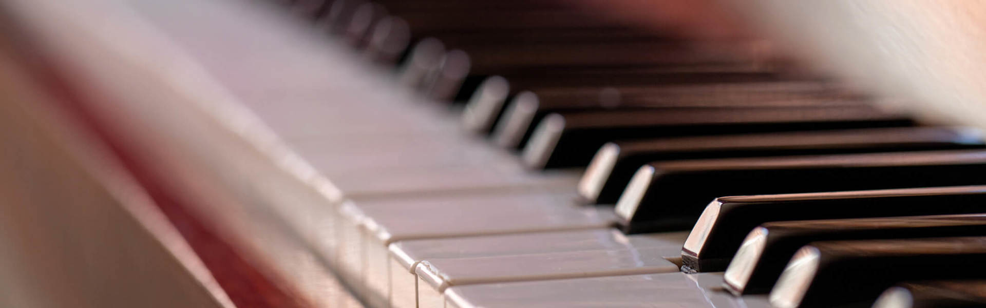 a close up of piano keys