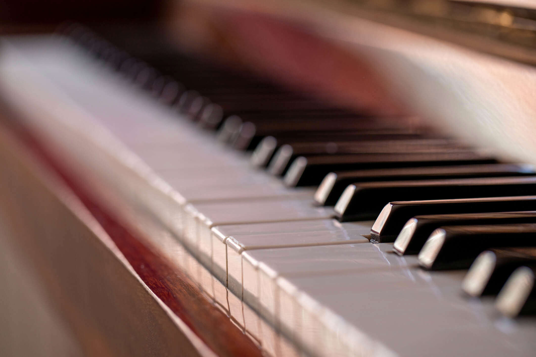 a close up of piano keys