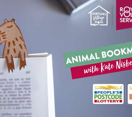 a colourful handmade animal book mark in a book