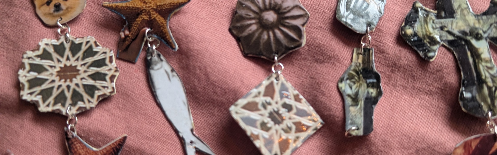 Main image: magazine cut out charms - made into DIY paper earrings. In a variety of images, shapes and sizes.