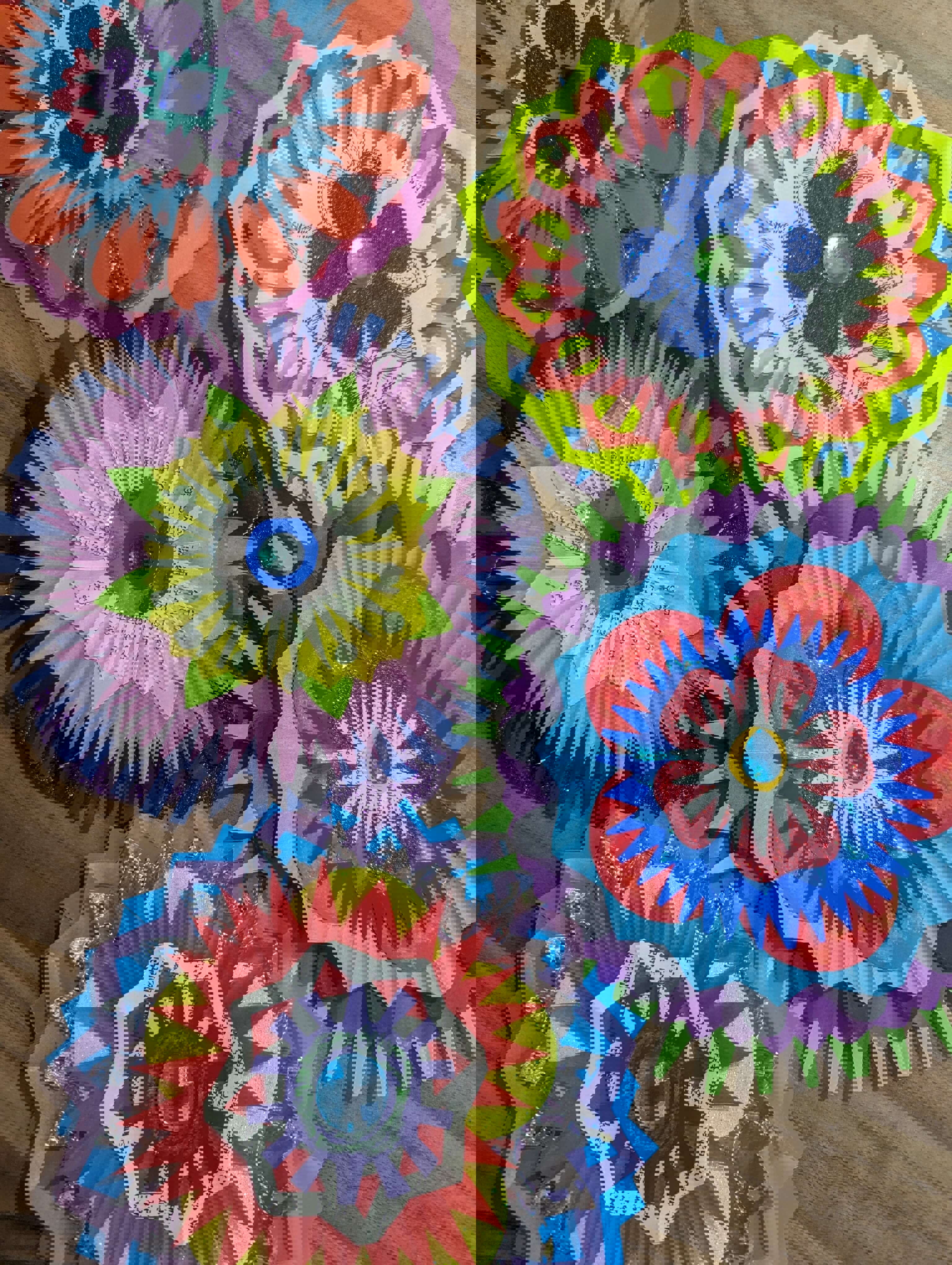 A close up of colourful DIY Christmas decorations made by Rosie Johnson