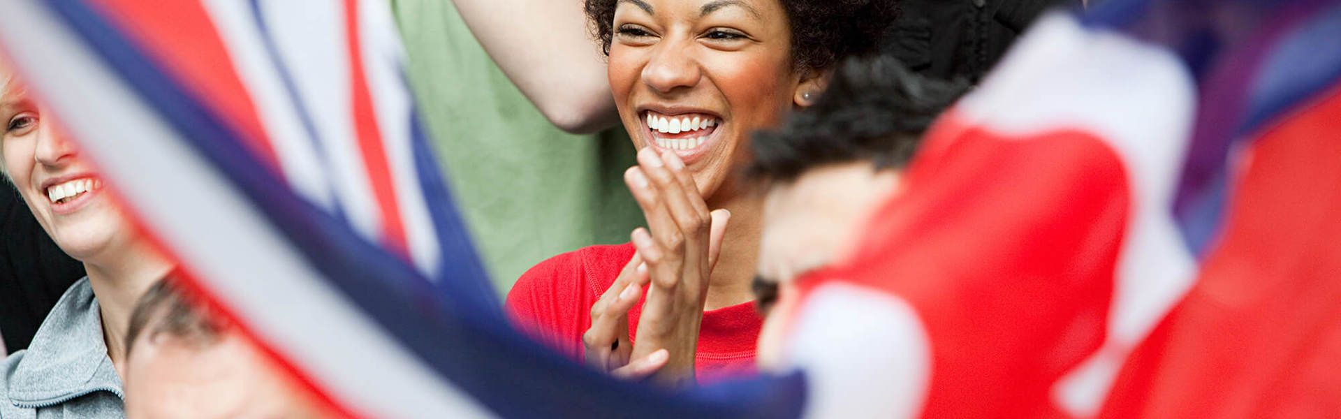 A woman celebrating at a National sporting event