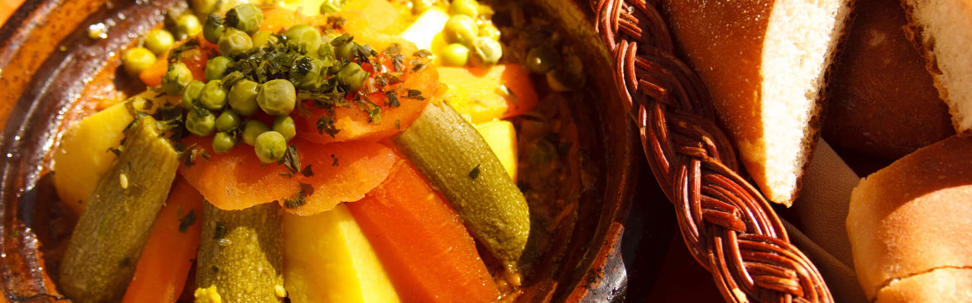 a traditional Moroccan vegetable tagine in a tagine pot