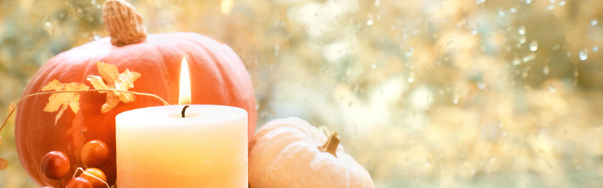 Autumnal items and a candle 