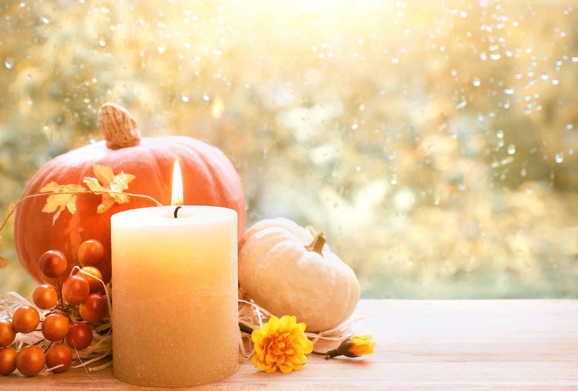 Autumnal items and a candle 