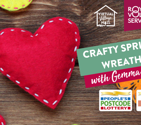 various felt flowers and heart shapes on a wooden background