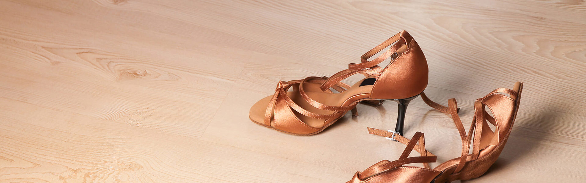 A pair of dancing shows on the floor