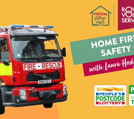 A vibrant red fire engine with the words "Home Fire Safety," promoting awareness and education on fire prevention at home.