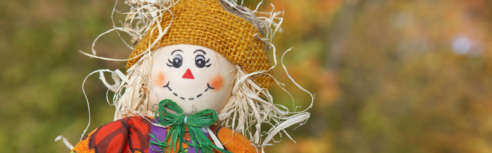 Main image: a mini scarecrow, with purple felt overalls and straw hands and hair.