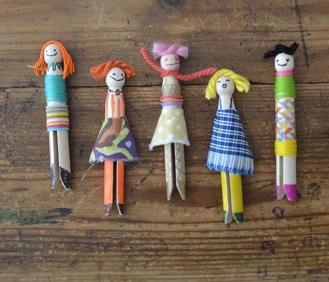 multicoloured peg dolls made from clothes pegs and scraps of fabric by Kate Nisbet