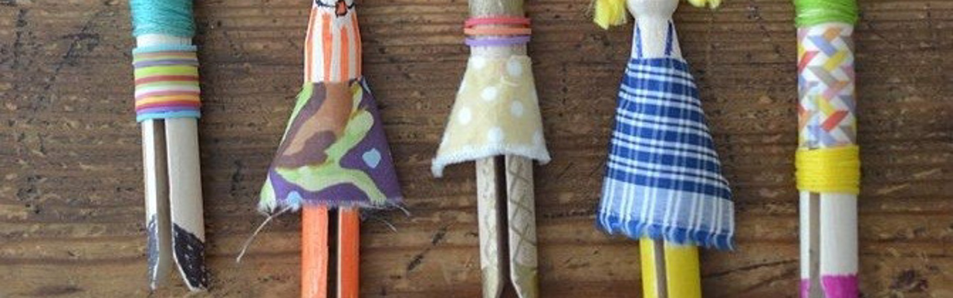 multicoloured peg dolls made from clothes pegs and scraps of fabric by Kate Nisbet