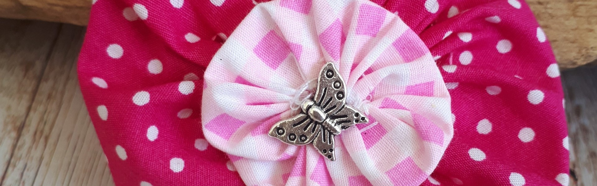 Hand made pink and red fabric flowers by Kate Nisbet