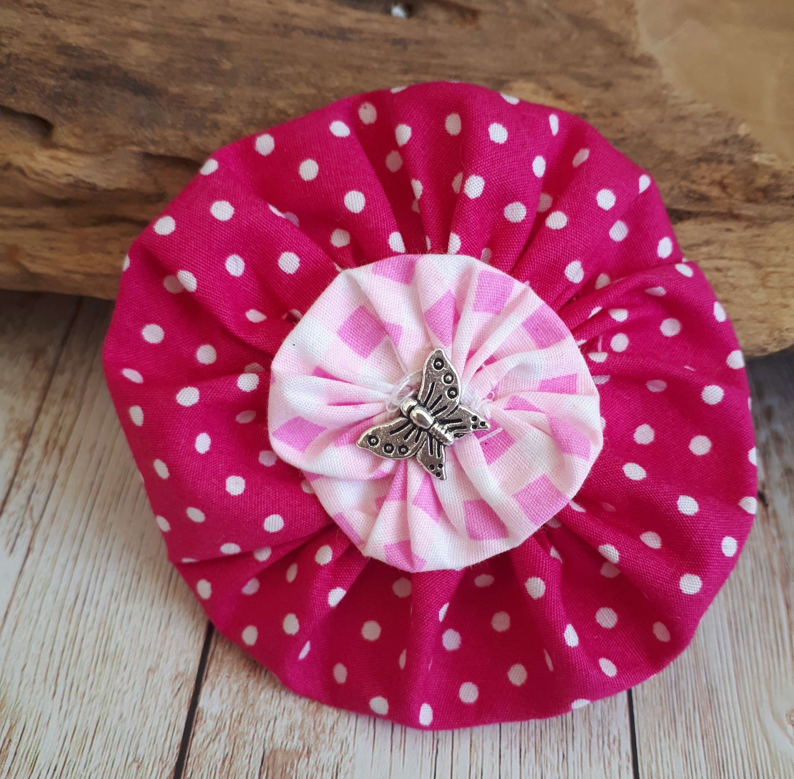 Hand made pink and red fabric flowers by Kate Nisbet