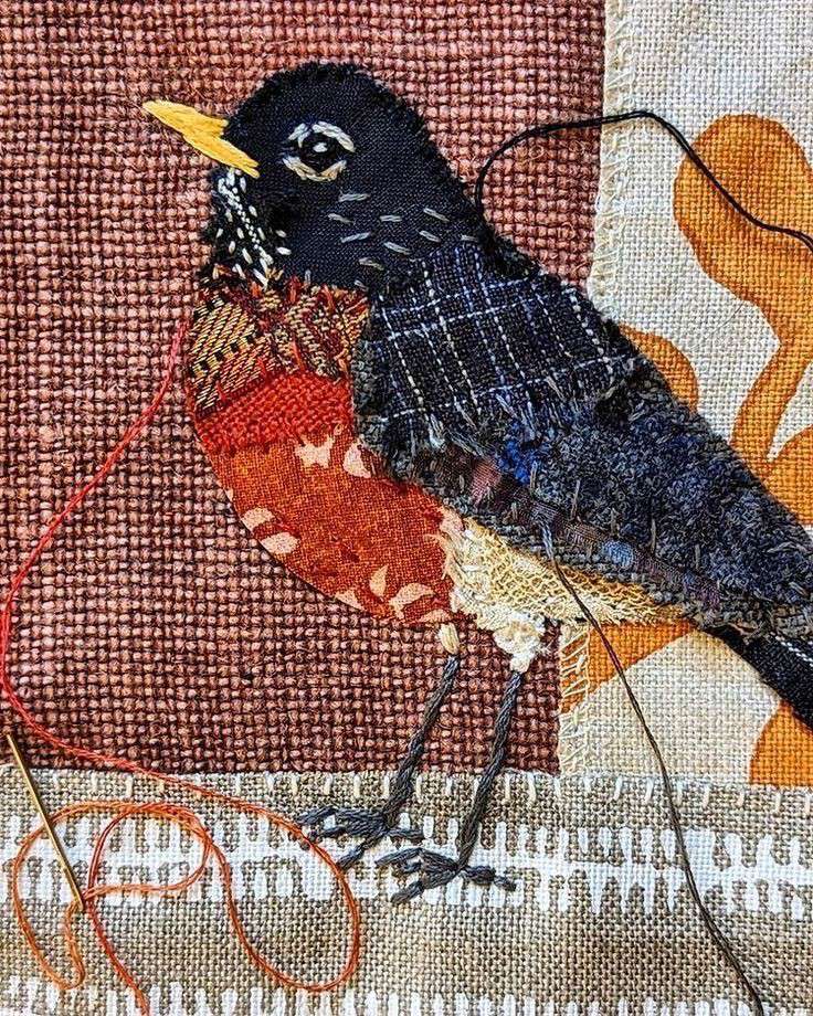 Main Image: A beautiful fabric collage bird, made using a variety of fabric scraps in blue and orange colours. Made using fabric collage techniques and slow stitching methods.