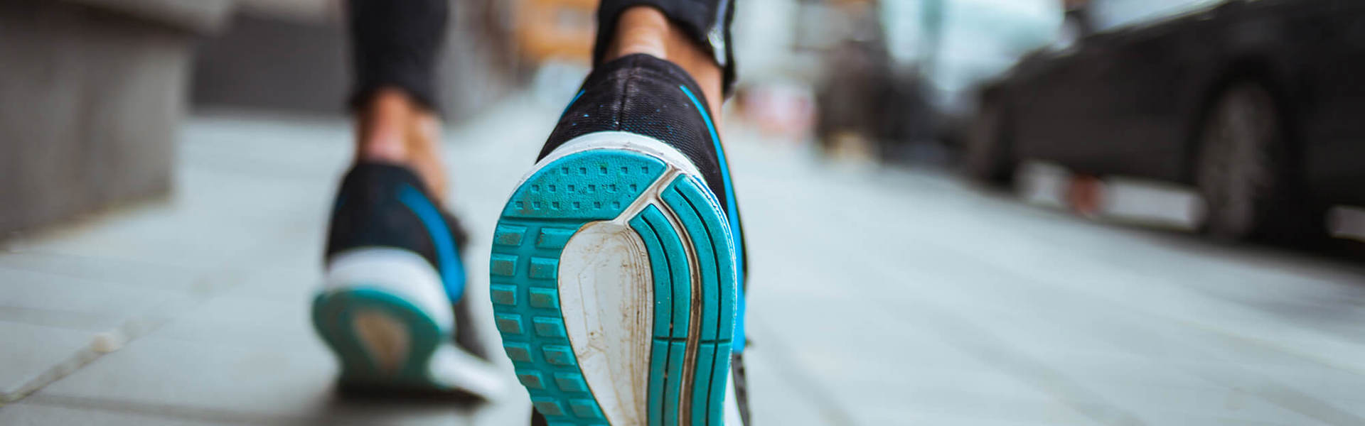 Feet in trainers walking