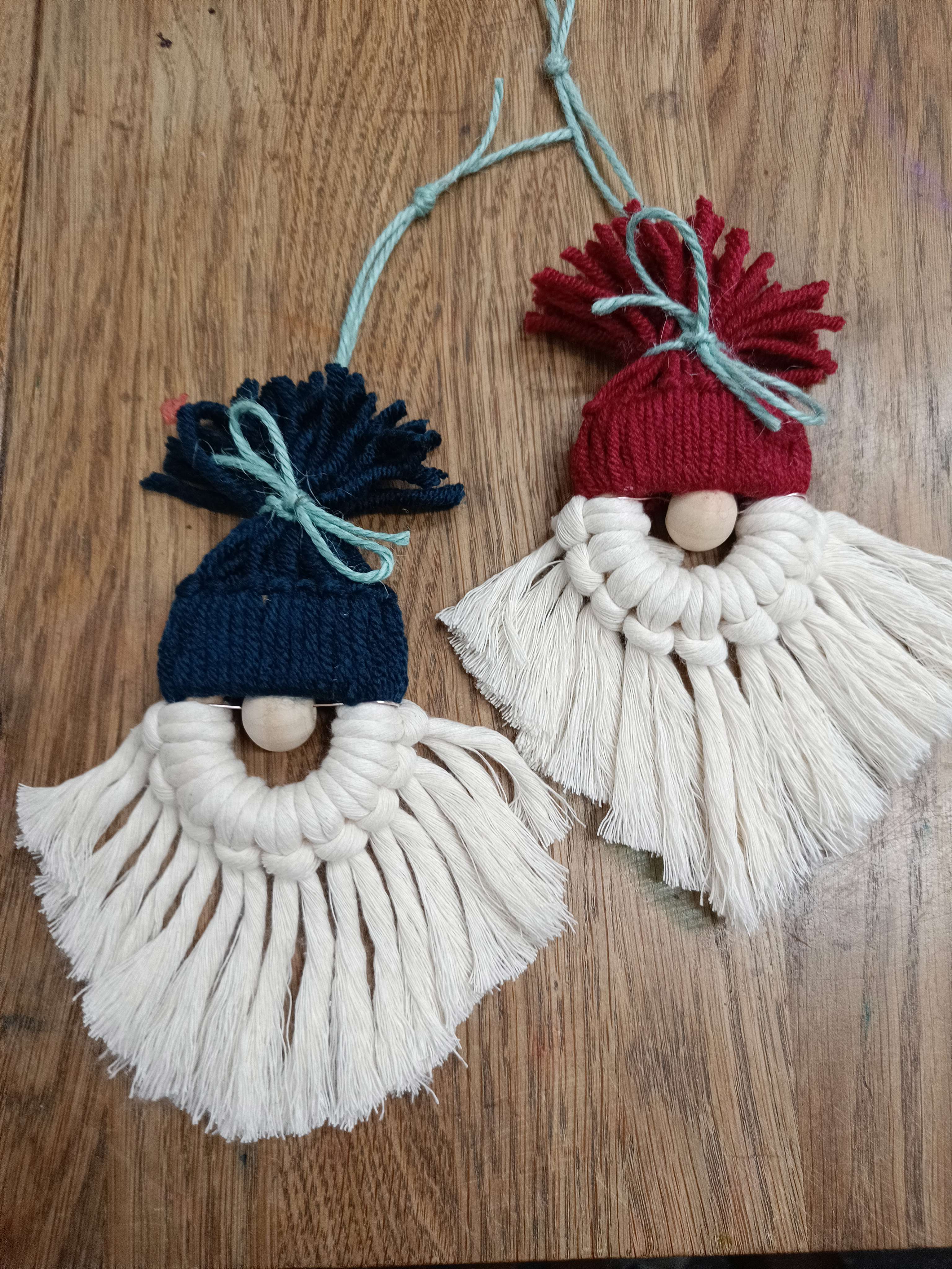 two handmade macramé Santa decorations made by Gemma Forde