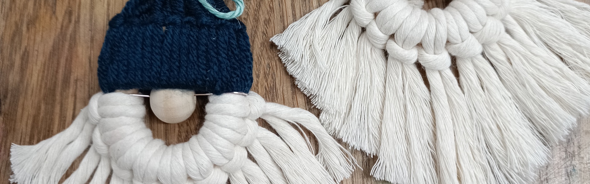two handmade macramé Santa decorations made by Gemma Forde