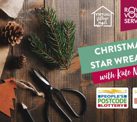 an overhead shot of a wooden table with various christmas themed crafting materials 