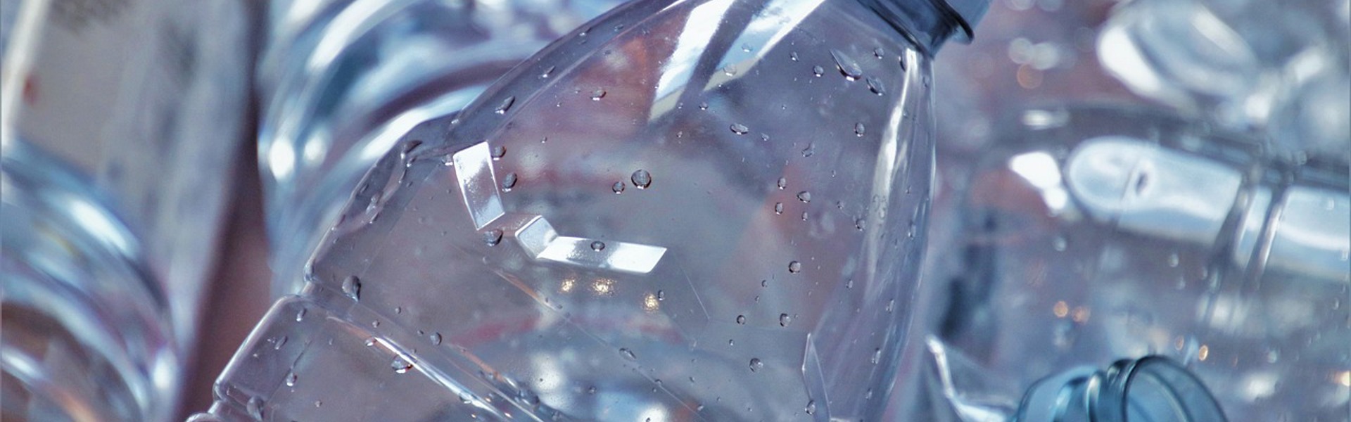 a close up of plastic water bottles